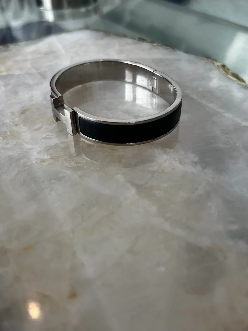 Hermes Silver-Tone Bracelet with Black Enamel H Detail